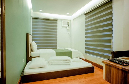 Capas Hotel | Estancia De Lorenzo Tarlac