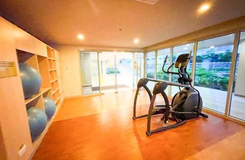 Tambo Apartment | Exquisite 2BR Corner Suite with Sunset, Okada View