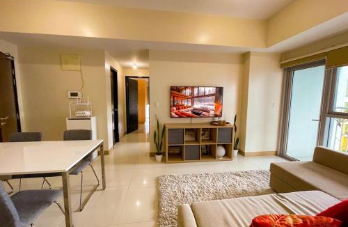 Tambo Apartment | Exquisite 2BR Corner Suite with Sunset, Okada View