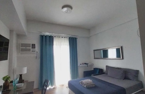 Mactan Export Processing Zone Apartment | Family Suite at the Amani Grand Resort Residences near Mactan Airport by A&C