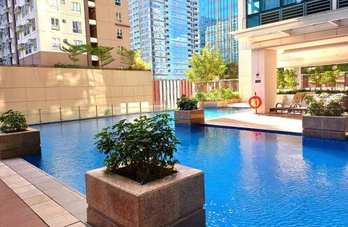 Pinagsama Apartment | FREE Welcome Breakfast, BGC 1BR, 300Mbps Fiber, Steps to Mitsukoshi & Uptown, 29K
