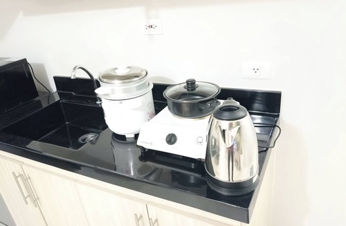 Basak Condo | Full Cozy 1BR w/Pool, Balcony w/Panoramic View, PrimeTV by Mall & Airport