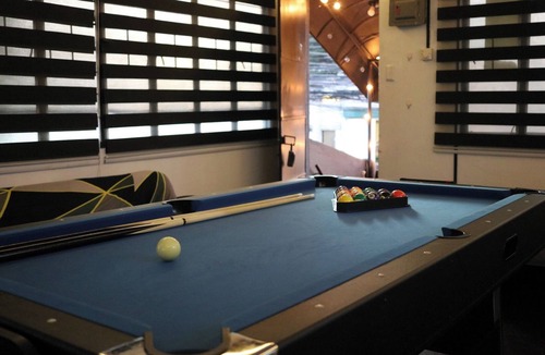 Bacoor City Apartment | Gaming Inn, perfect for Date Nights, Events, Gatherings and BBQs! Upto 14 Pax