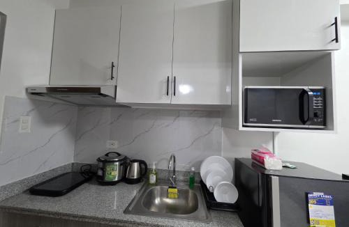 Guadalupe Apartment | Gem's Silid Tulugan