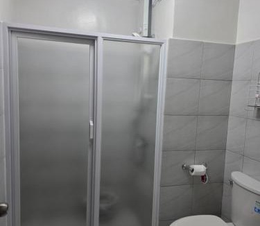Guadalupe Apartment | Gem's Silid Tulugan