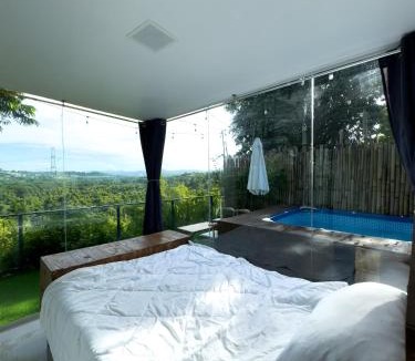 CSJDM House | Glass Cabin Secluded Overlooking Oasis with pool