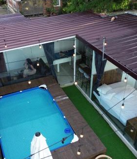 CSJDM House | Glass Cabin Secluded Overlooking Oasis with pool