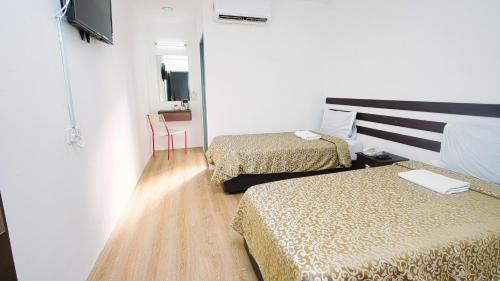 Downtown George Town Hotel | Grand Inn Hotel - Macalister Road