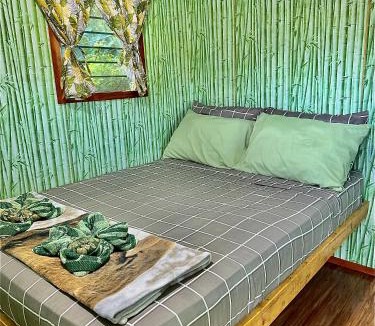 Basdiot House | Green Acres Village Cabin Rental with Air conditioner