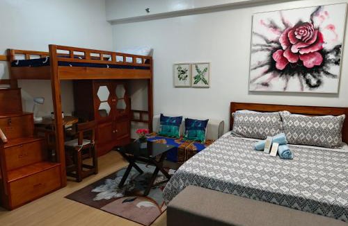 Trece Martires Apartment | Happy Stays B - 300mbps - 65"TV Netflix, Disney - Washer