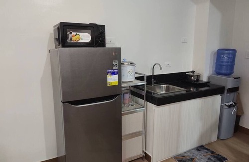 Trece Martires Apartment | Happy Stays B - End Unit at SMDC HOPE Residences Trece Martires Cavite