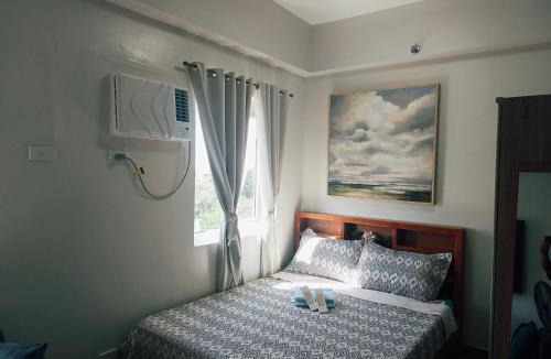 Trece Martires Apartment | Happy Stays D - 300mbps - 65"TV NetFlix, Disney - Washer
