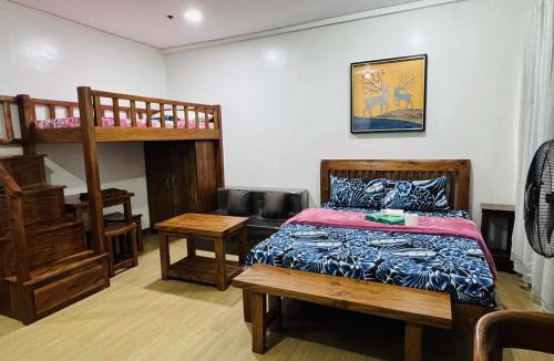 Trece Martires Apartment | Happy Stays E - 300mbps - 65"TV NetFlix, Disney - Washer