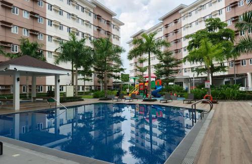 Trece Martires Apartment | Happy Stays E - 300mbps - 65"TV NetFlix, Disney - Washer