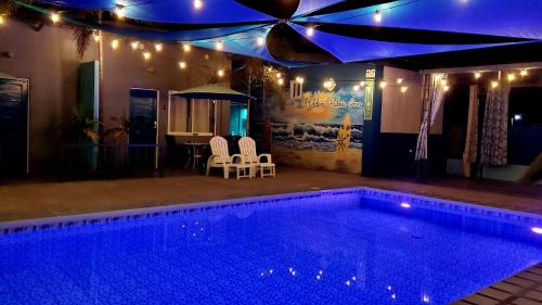 San Juan Hostel | Hidden Palms Inn & Resort Quadruple