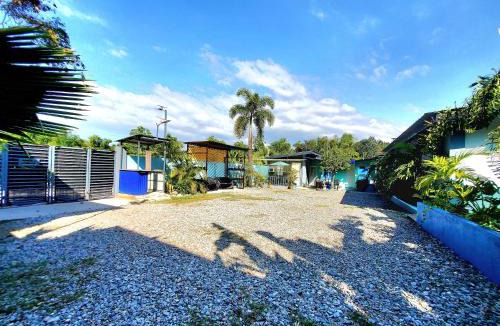 San Juan Hostel | Hidden Palms Inn & Resort Quadruple