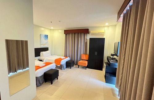 San Pedro Hotel | Holiday Suites Puerto Princesa