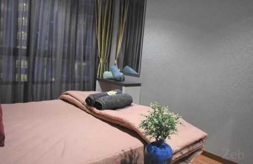 Shah Alam Apartment | i-City-Casa Liberty - Wifi - NETFLIX - Movies - Parking - Sleeps 7 pax