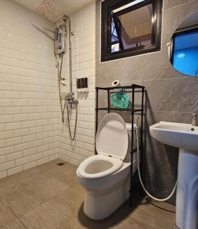Tagudin Bed & Breakfast | Jolie Joe's Bed and Breakfast with Shared Bathroom
