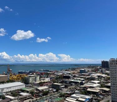North Reclamation Area Apartment | La Maria Rentals - Cozy 2 Double Beds with Balcony, Walk to SM Mall Cebu