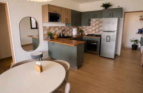 Barrio New York Apartment | LEVEL 2, Lovely 2-bedroom apartment with AC steps to malecon in Santa Barbara