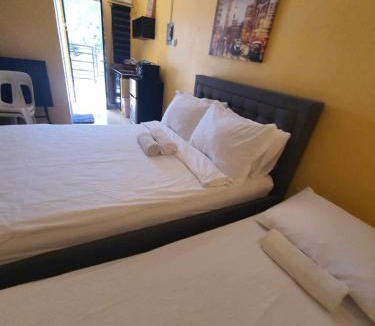 Lucena Apartment | Lucena Meg's Studio Apmnt Deluxe rm-Near SM-Wifi