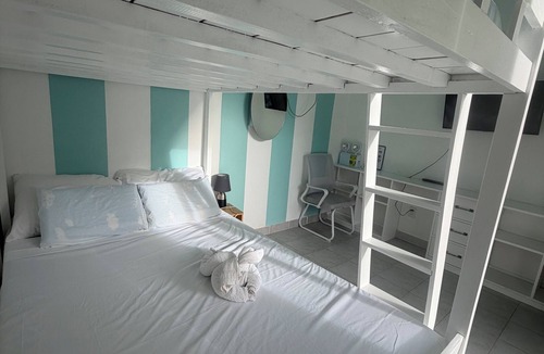 San Remigio Bed & Breakfast | Lucena’s B&B near Maravilla white sand beach.Good for 8 guests