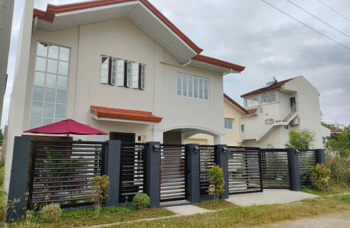 Alaminos Apartment | Lucky Swiss Transient House Alaminos - Entire House near Hundred Islands