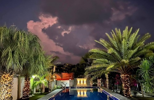 Bacnotan Villa | Luxurious,Private,Beachfront home with Garden and Stunning Pool Views