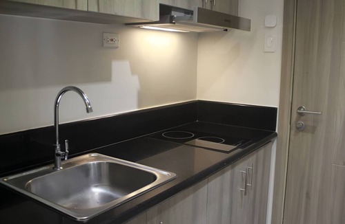 Pasay Apartment | Luxury Bay Condo near MOA With Balcony Free Wi-Fi