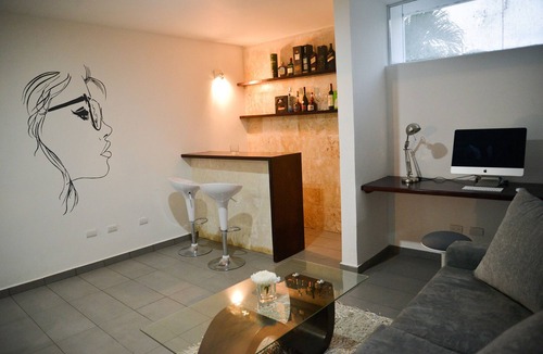 Villas Ana Maria Hotel | Luxury guest-friendly room in central Sosua, private bar, adults only