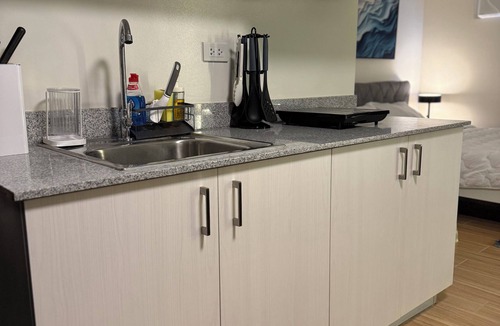 Carmona Condo | Maison Angela Suite, Your Cozy Escape with Gym, Pools, Skate Space & Movies