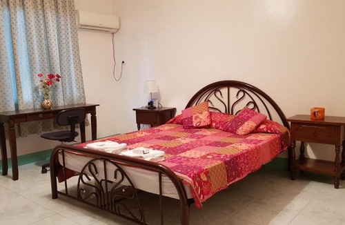Baybay City Apartment | Manuela's Home - A Home away from home!