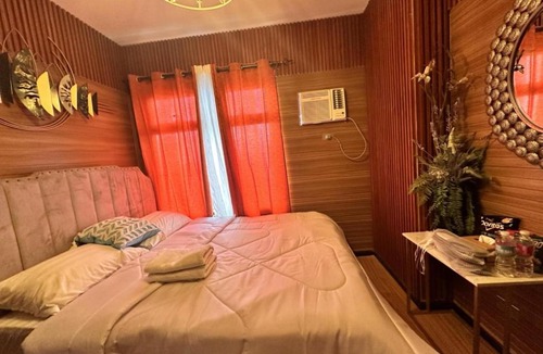Brgy. 719 Apartment | Modern 1 BR Condo near Airport, MOA, PICC, Star City, OKADA With Fast WIFI & Netflix Free Pool Access