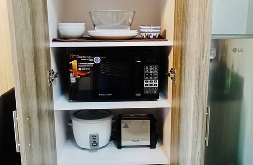 Basak Condo | “Modern 1BR Condo – Steps from Beaches & Airport”