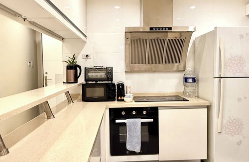 Bonifacio Global City Condo | Modern 4BR in Central BGC walk to Shangrila, St. Lukes & One Bonifacio Mall