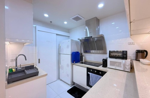 Bonifacio Global City Condo | Modern 4BR in Central BGC walk to Shangrila, St. Lukes & One Bonifacio Mall