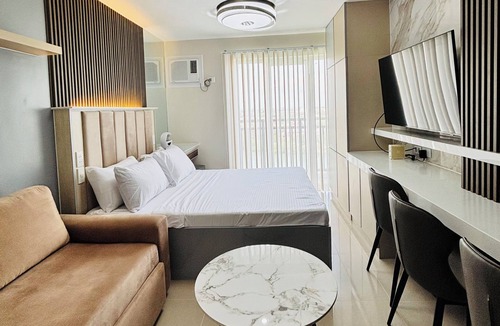 Iloilo City Proper Condo | Modern Condo Room With City View