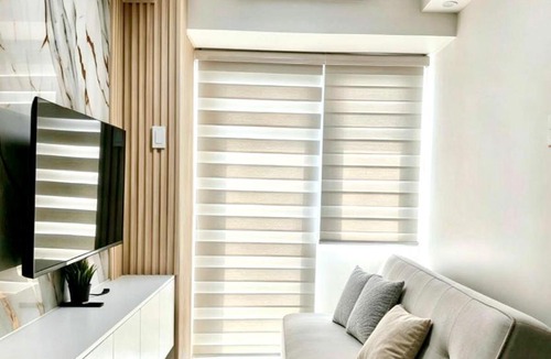 Barangay 76 Apartment | Modern Haven Staycation near MOA - 1BR at Shore3T1 -City VIew