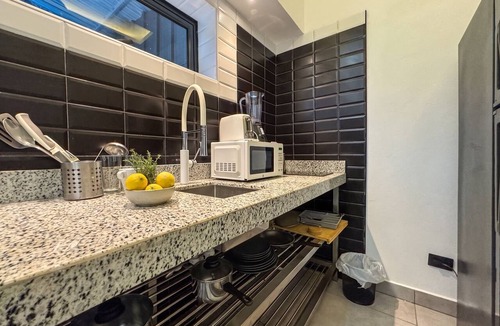 El Batey Apartment | Modern Sosúa Studio at Rizz Suites – Pool, A/C & Walk to Beach
