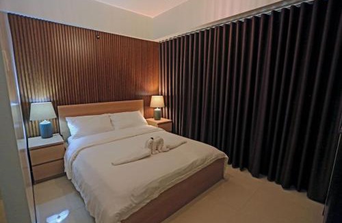 Bonifacio Global City Apartment | Modern Stylish Condo in McKinley WiFi