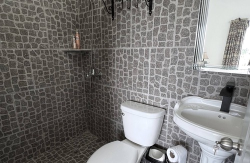 Cabrera House | Mountain view suite with balcony, pool, sitting area, & more- close to beach!
