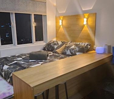 South Triangle Apartment | MPlace South Triangle Staycation in Quezon City by HARTCHOI