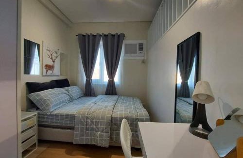 Trece Martires Apartment | NamiSanji Staycation @HOPE RESIDENCES