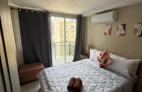 Cebu Condo | New 2-bedroom condo with WiFi & Netflix 2 minutes walk to Ayala Mall