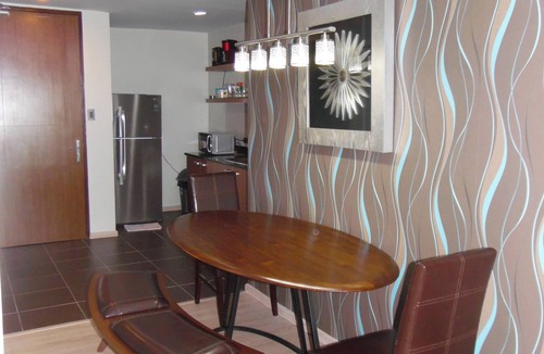 Lapu-Lapu Condo | new Lux. 2BR condo + 2 pools, woow oceanviews, Gym, Beach, behind Mactan Newtown