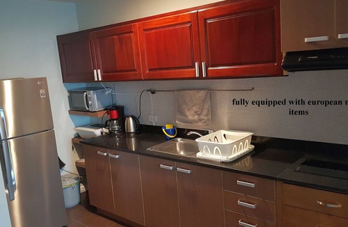 Lapu-Lapu Condo | new Lux. 2BR condo + 2 pools, woow oceanviews, Gym, Beach, behind Mactan Newtown