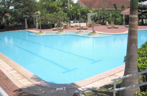 Lapu-Lapu Condo | new Lux. 2BR condo + 2 pools, woow oceanviews, Gym, Beach, behind Mactan Newtown