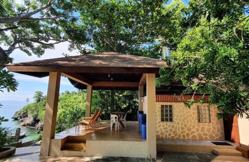 Tabogon Villa | Ojo Dorado (The Pavilion Room)