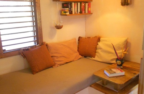 Las Galeras House | Palm-covered house in the tropical garden
